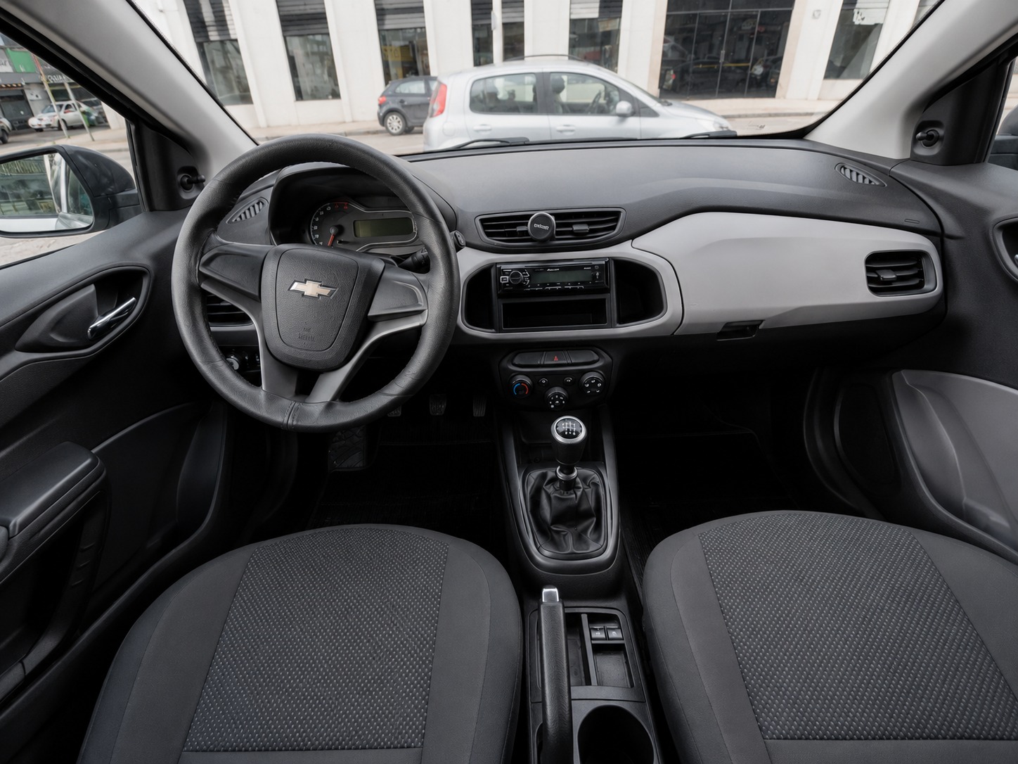 interior onix frente